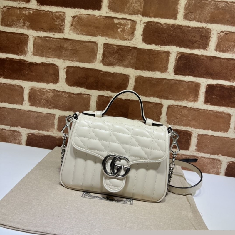 G*u*i top handle bags